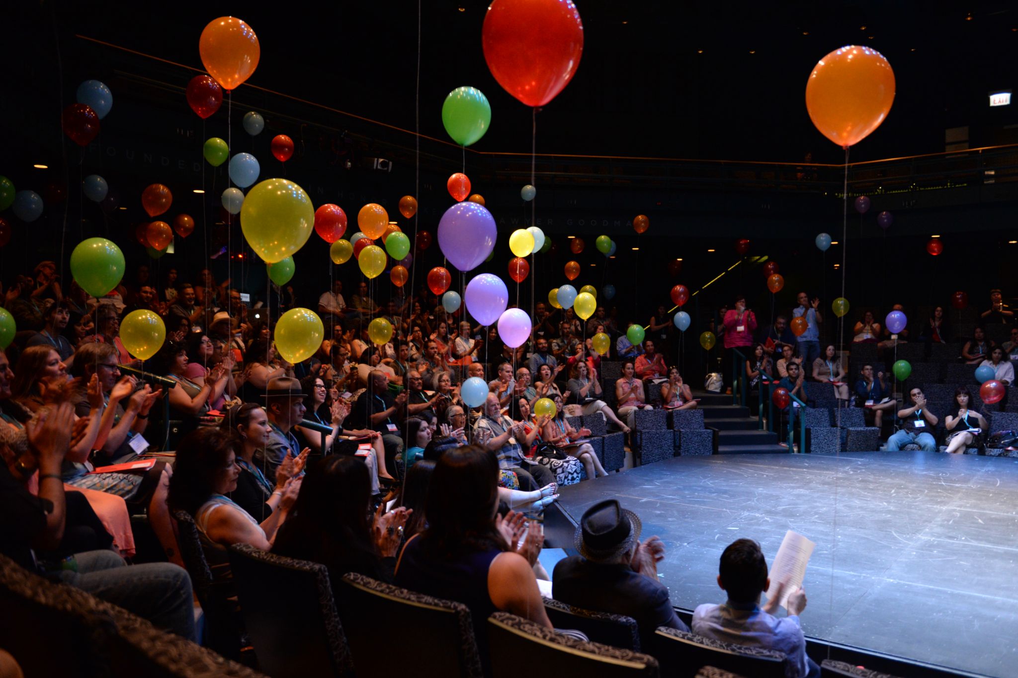 LTC Carnaval crowd holding ballons around stage